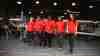 AIM students walking out of campus hangar