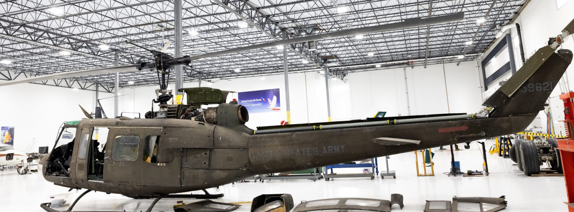 Military helicopter in a hangar at an AIM campus