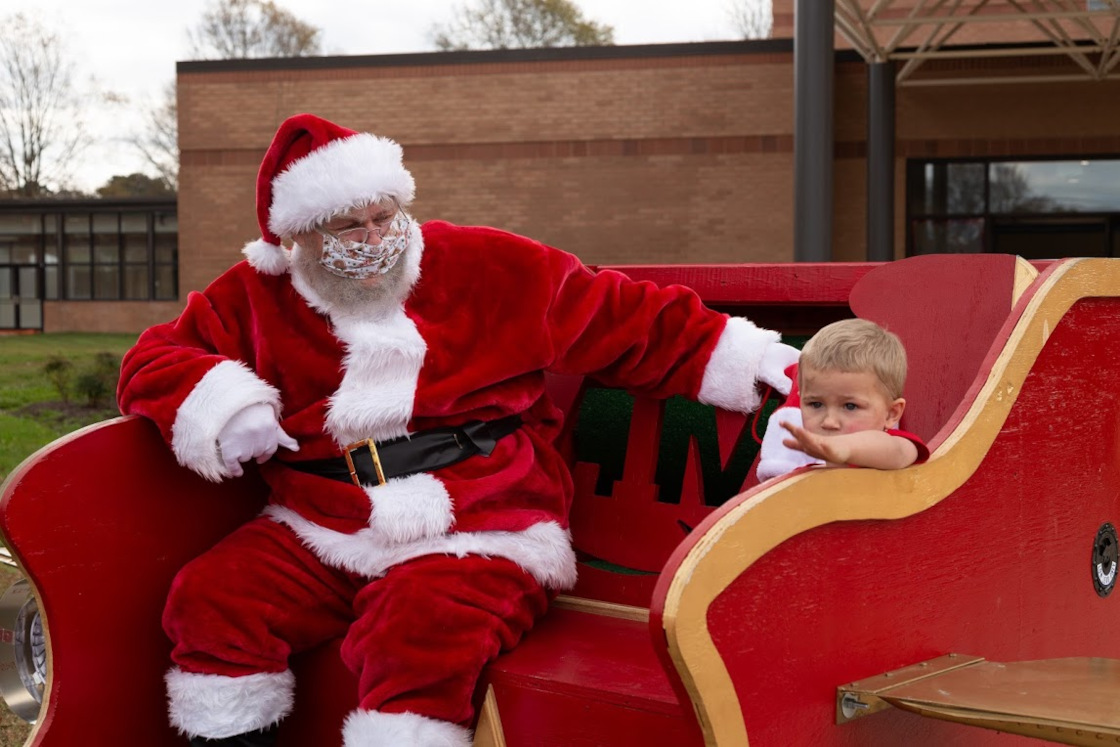 Santa sitting with a child