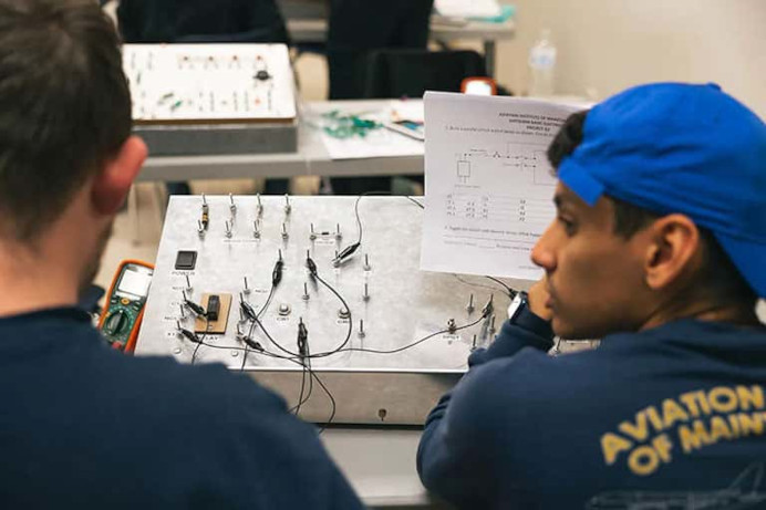 Aviation Maintenance Technical Engineer program students working on electronics