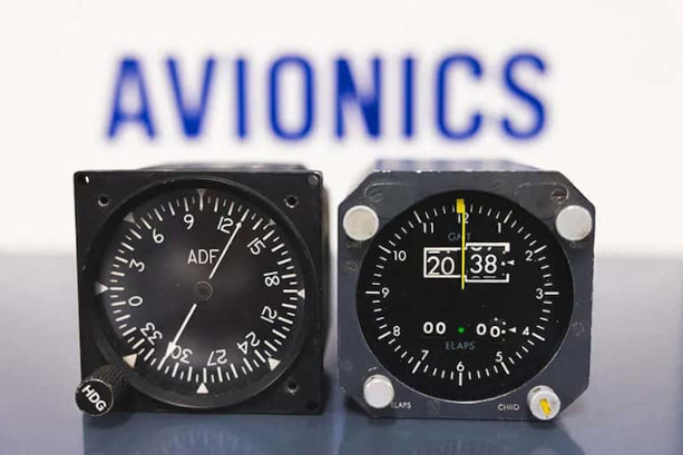 Avionics dials in front of a sign that says Avionics