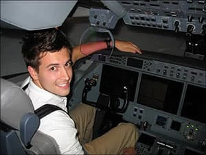 Brennan Haltli sitting at the controls of an unmanned aircraft
