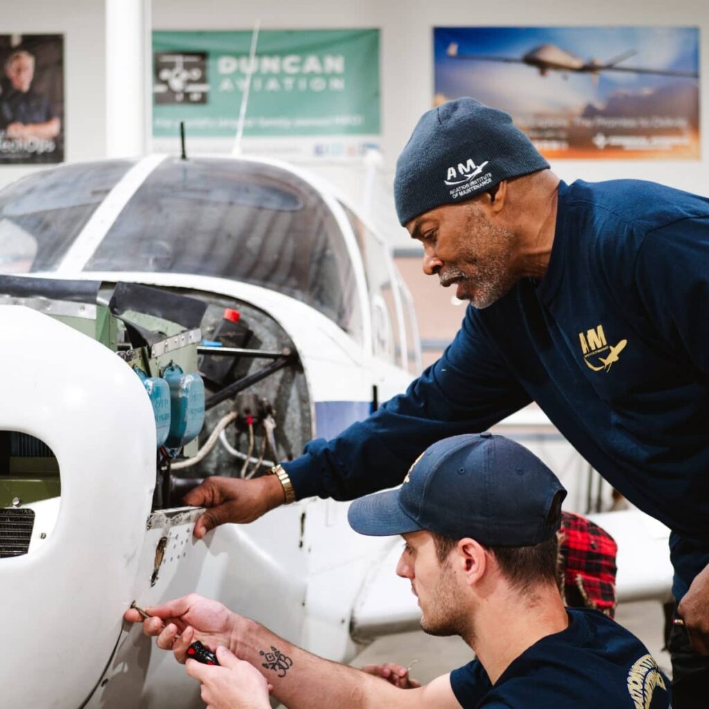 Aviation Institute of Maintenance Students Working